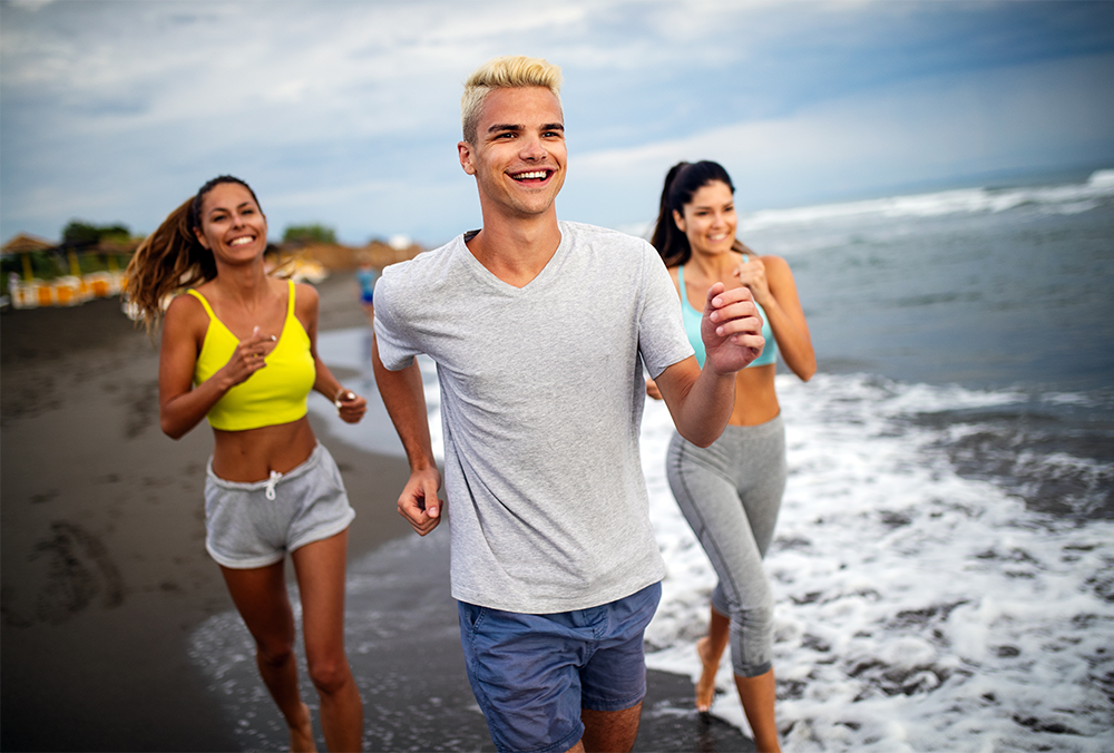 group-of-friends-running-at-the-beach-on-beautiful-2025-03-15-19-37-52-utcm.png